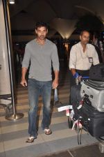 John Abraham snapped at the airport in Mumbai on 4th Jan 2012 (11).jpg